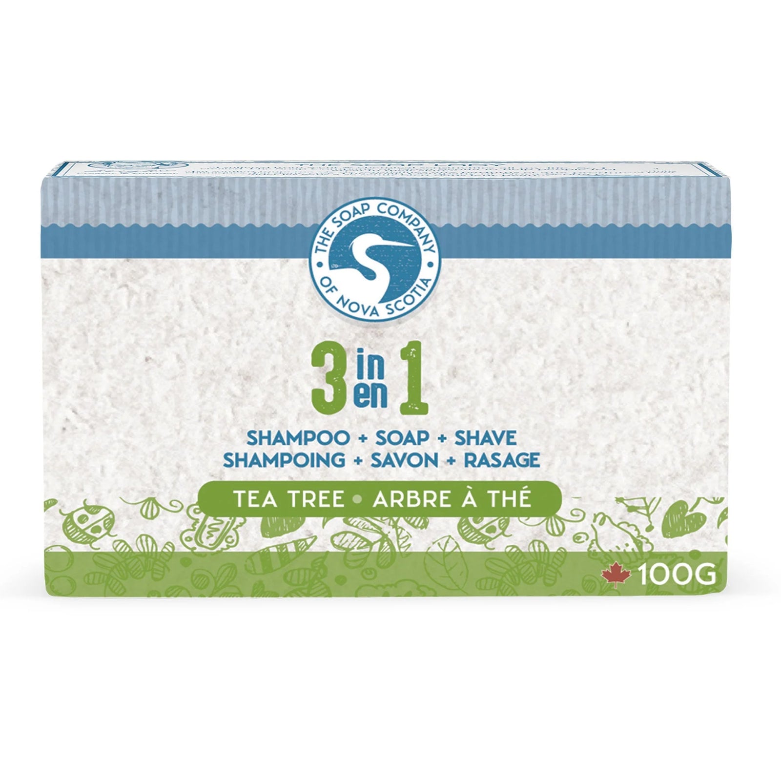 Two bars of soap on a marble surface with greenery around